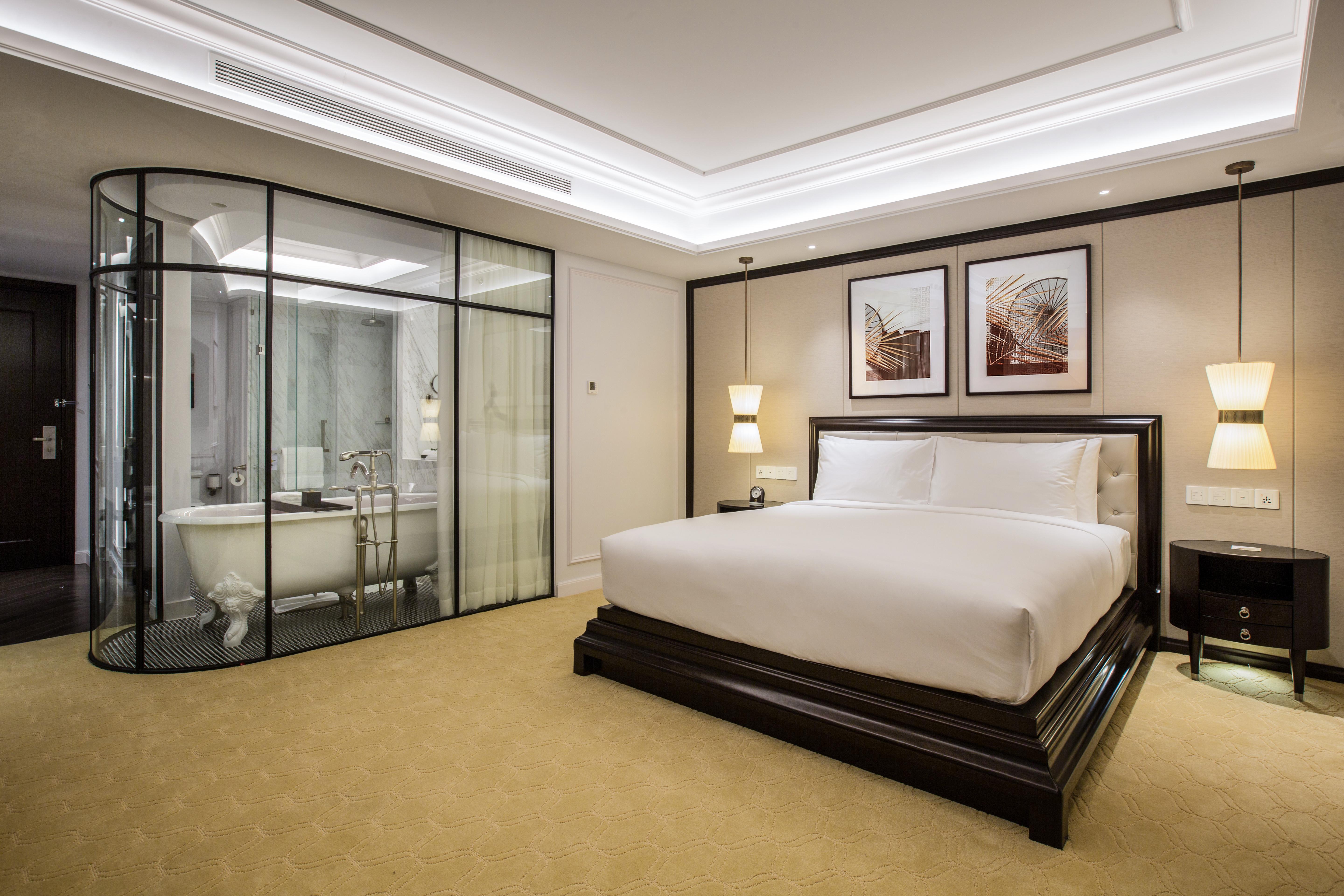 Mai House Saigon Hotel Ho Si Minh-város Kültér fotó A bedroom at The St. Regis Mumbai